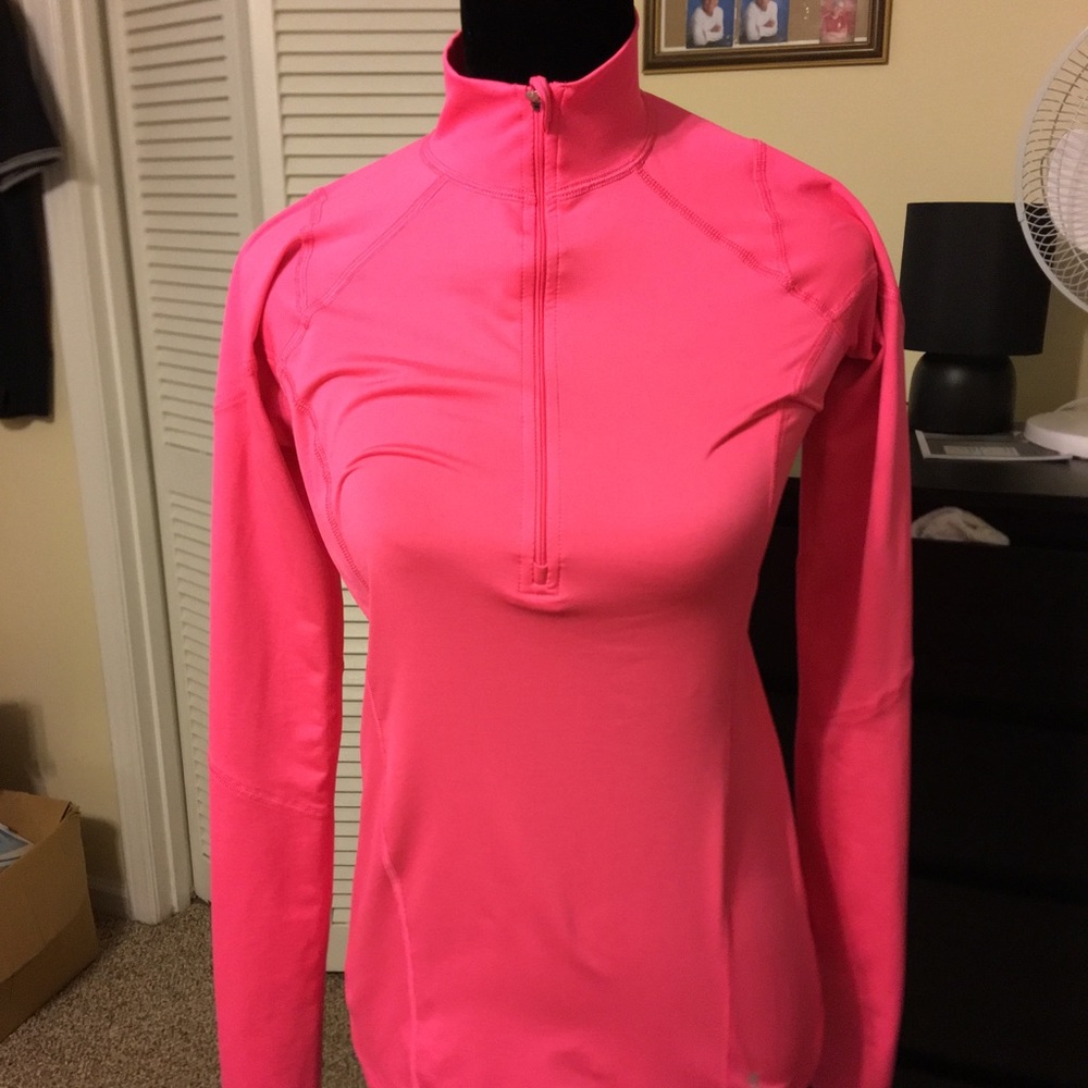 Beautiful dri fit Reebok, half zip pullover.